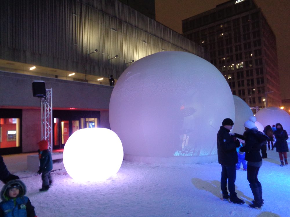 An illuminated art installation in the Quartier des Spectacles